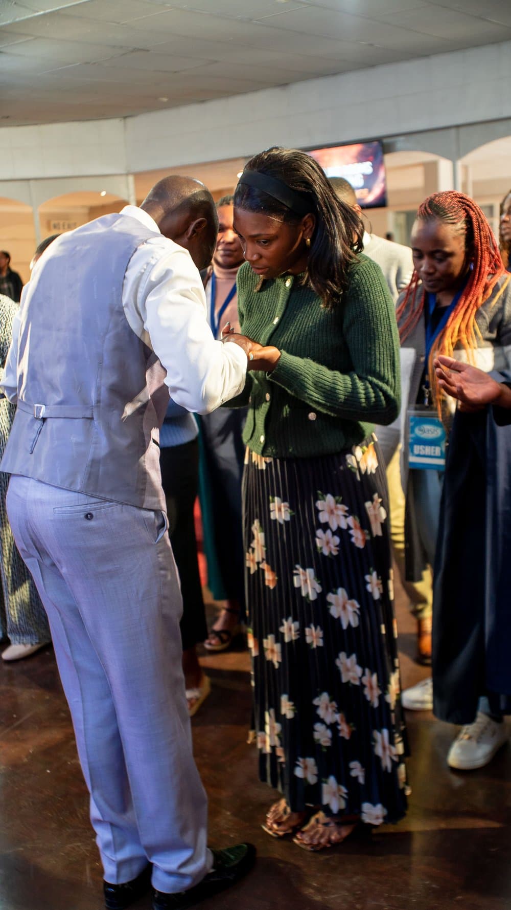 Laying on of hands in prayer